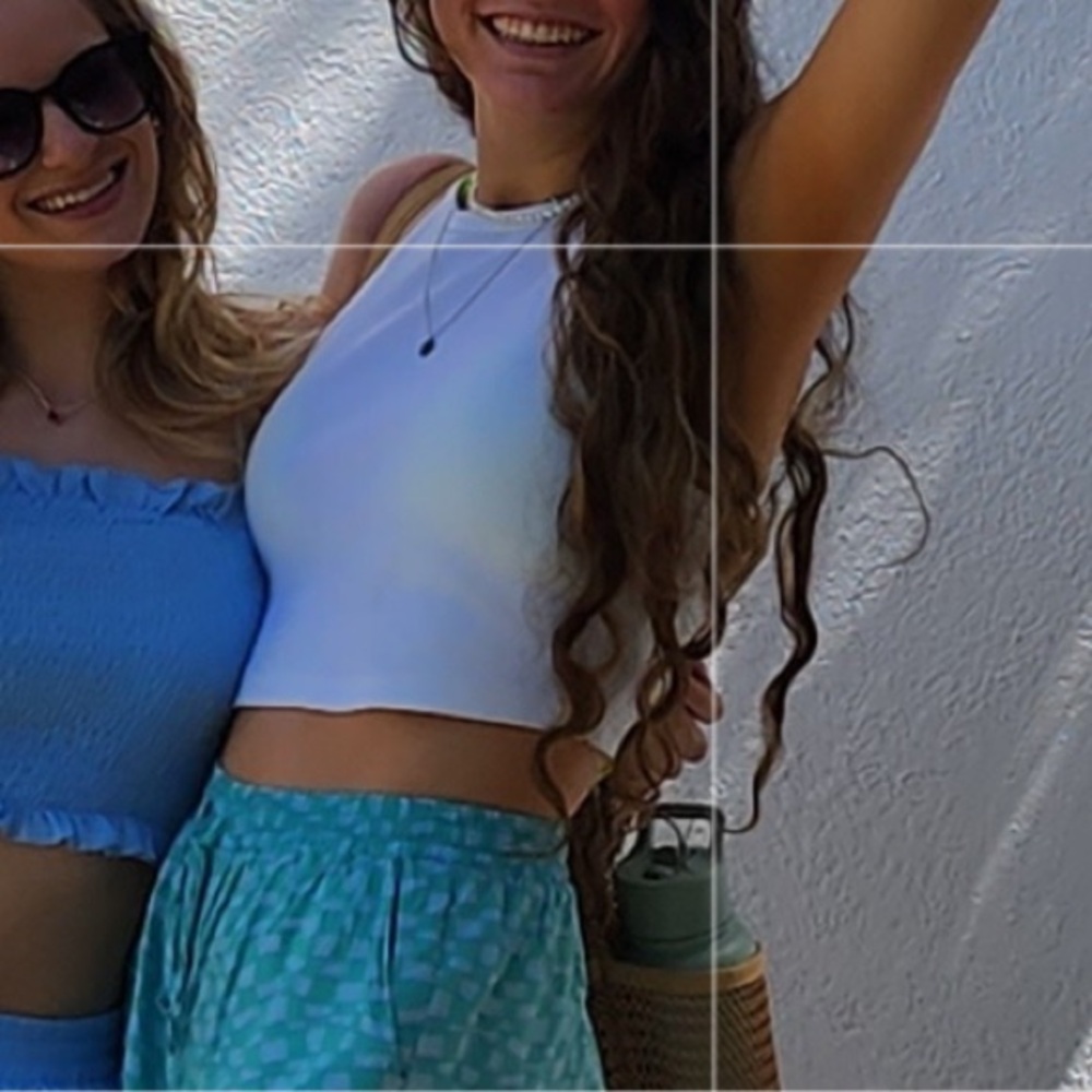 Curved hem white tank top
